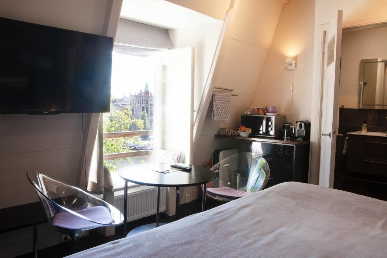 Zwanestein Canal House Amsterdam Eksteriør bilde